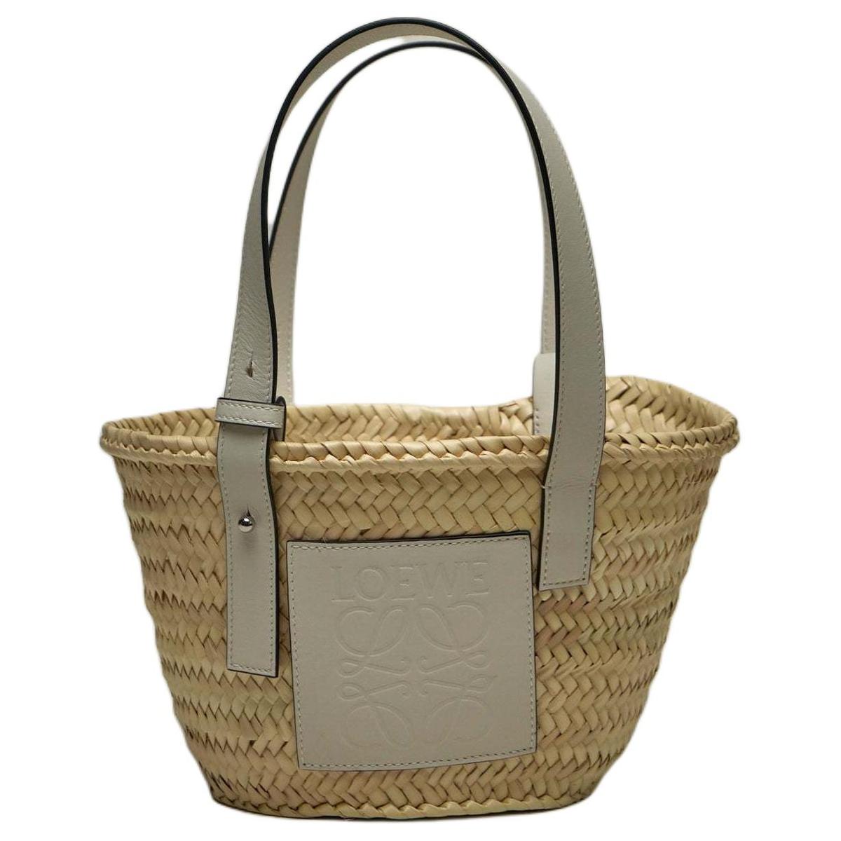 https://d2cva83hdk3bwc.cloudfront.net/A223S93X28-2163-loewe-palm-leaf-basket-bag-handbag-women-s-natural-beige-white-1.jpg