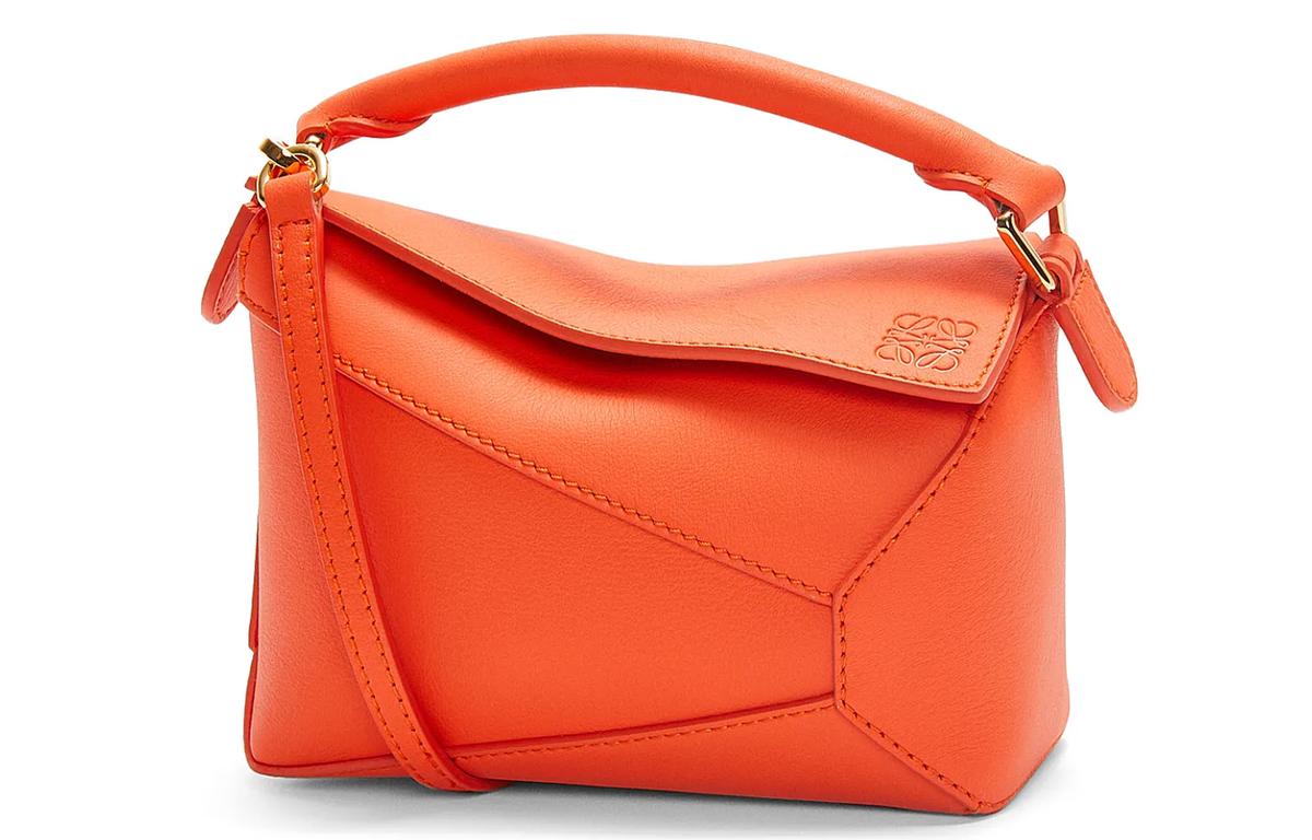 https://d2cva83hdk3bwc.cloudfront.net/A510P88X26-5959-loewe-puzzle-cow-leather-shoulder-bag-crossbody-bag-handbag-mini-women-s-vibrant-orange-1.jpg
