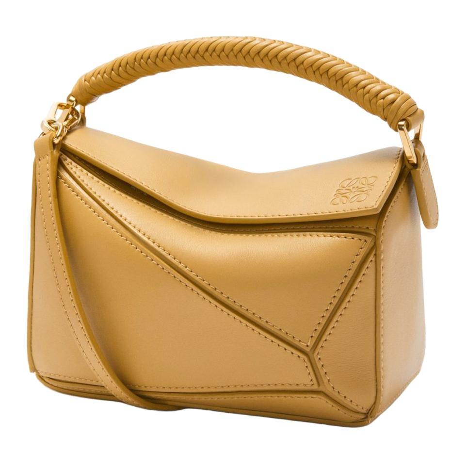 https://d2cva83hdk3bwc.cloudfront.net/A510U95X86-6715-loewe-puzzle-soft-calfskin-shoulder-bag-crossbody-bag-handbag-mini-women-s-sahara-color-1.jpg