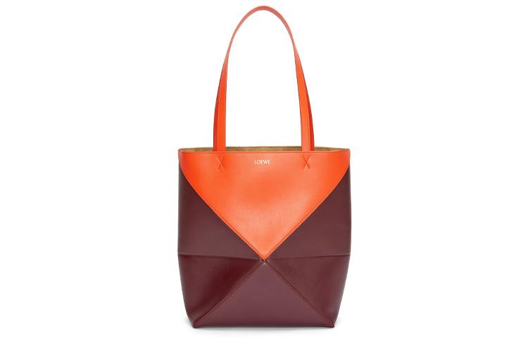 https://d2cva83hdk3bwc.cloudfront.net/A779G50X18-8449-loewe-shiny-cow-leather-tote-bag-shopping-bag-handbag-regular-women-s-vibrant-orange-with-burgundy-red-accents-1.jpg