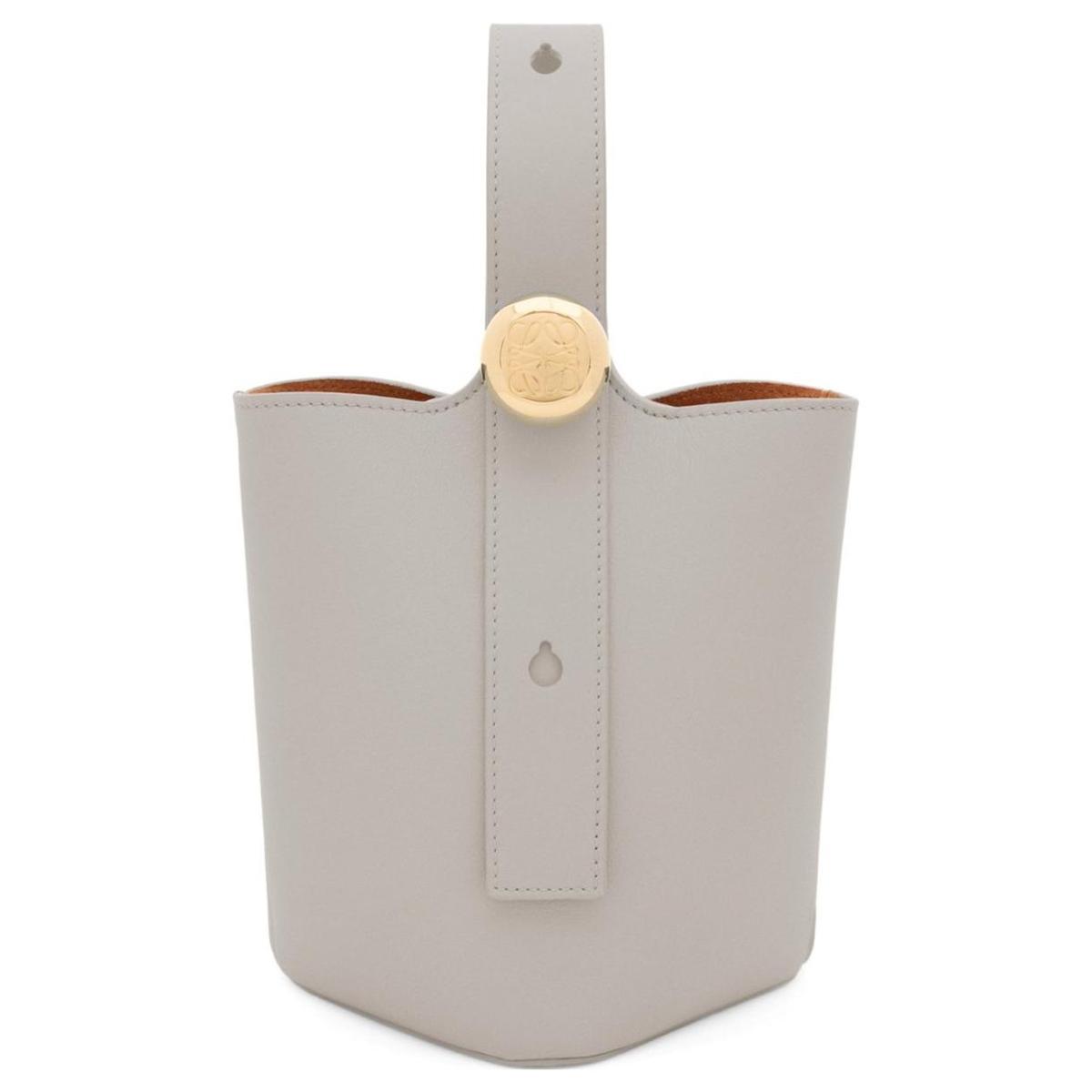 https://d2cva83hdk3bwc.cloudfront.net/AANBBBMX01-6579-loewe-pebble-bucket-smooth-calf-leather-bucket-bags-shoulder-bag-crossbody-bag-handbag-mini-women-s-gray-1.jpg