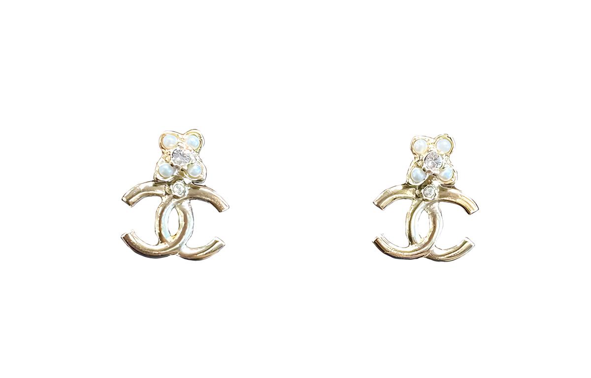 https://d2cva83hdk3bwc.cloudfront.net/ABC106-B14702-NS709-chanel-stud-earrings-women-s-1.jpg