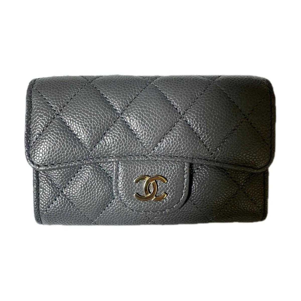 https://d2cva83hdk3bwc.cloudfront.net/AP0214-B10583-NR652-chanel-embossed-calfskin-with-grains-coin-purse-wallets-card-holders-women-s-dark-gray-1.jpg