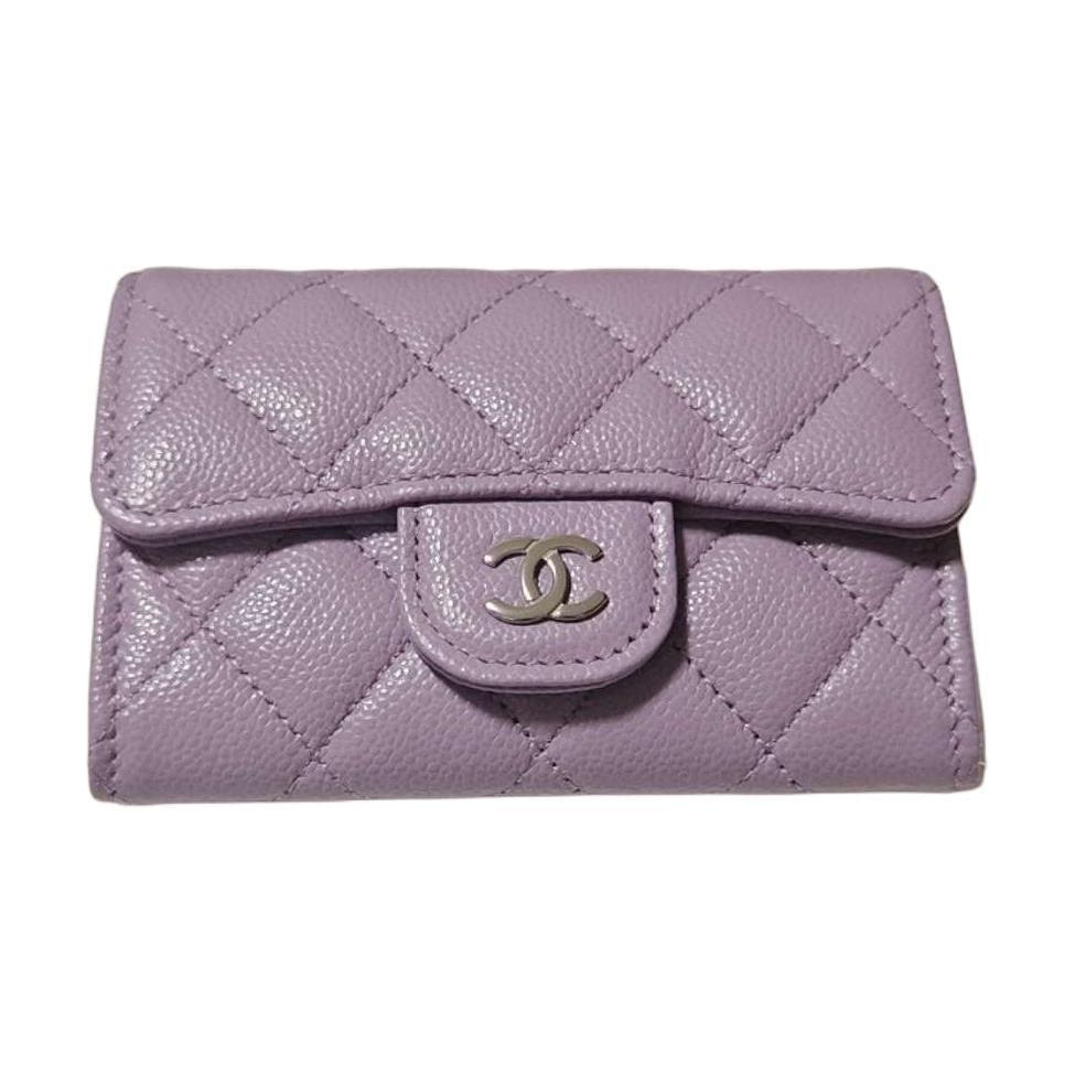 https://d2cva83hdk3bwc.cloudfront.net/AP0214-B15532-NU932-chanel-shiny-beaded-embossed-cow-leather-card-sleeve-card-holder-women-s-stellalou-purple-1.jpg