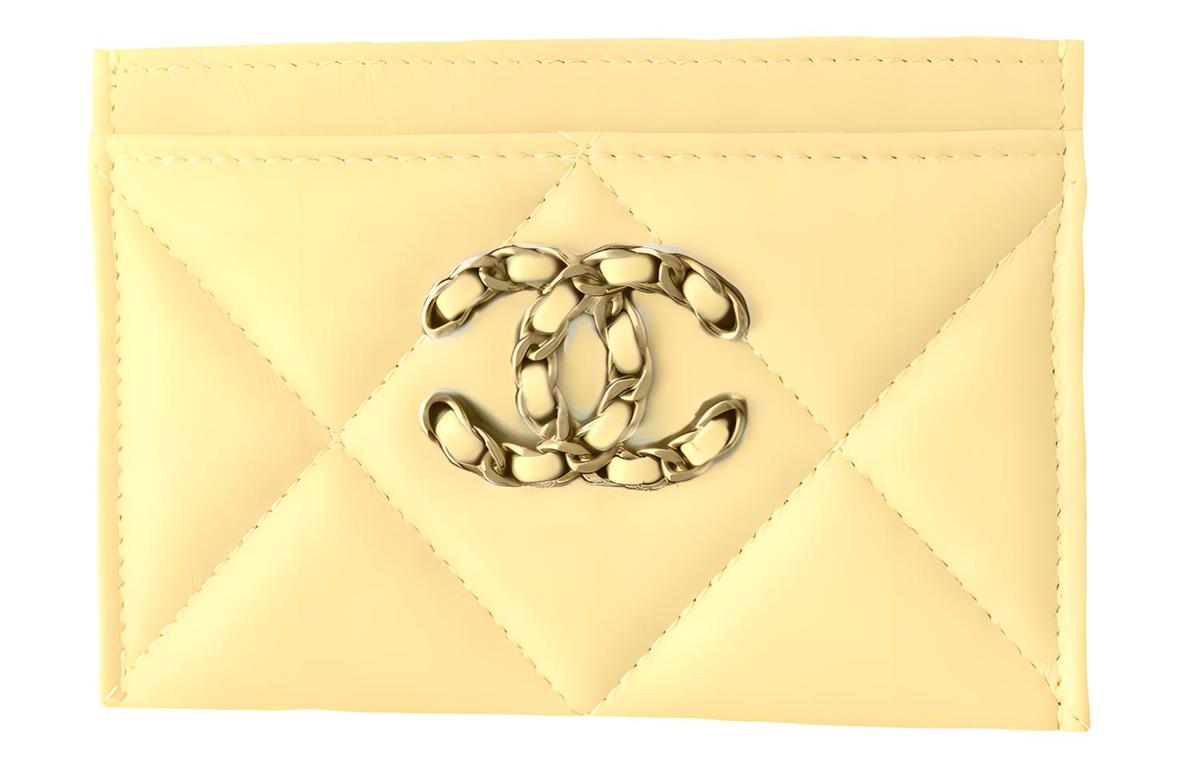 https://d2cva83hdk3bwc.cloudfront.net/AP1167-B04852-NG754-chanel-lambskin-coin-purses-card-holders-women-s-light-yellow-1.jpg