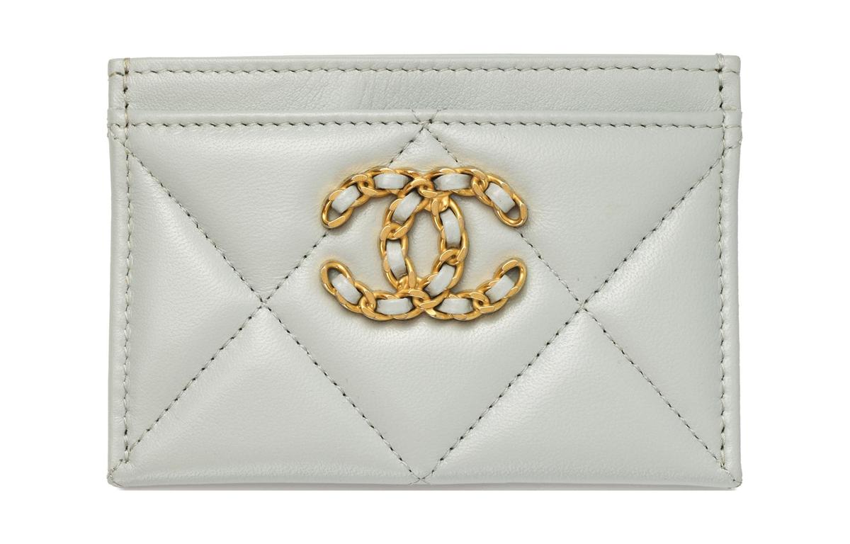 https://d2cva83hdk3bwc.cloudfront.net/AP1167-B04852-NN268-chanel-19bag-lambskin-card-holder-women-s-gray-blue-1.jpg