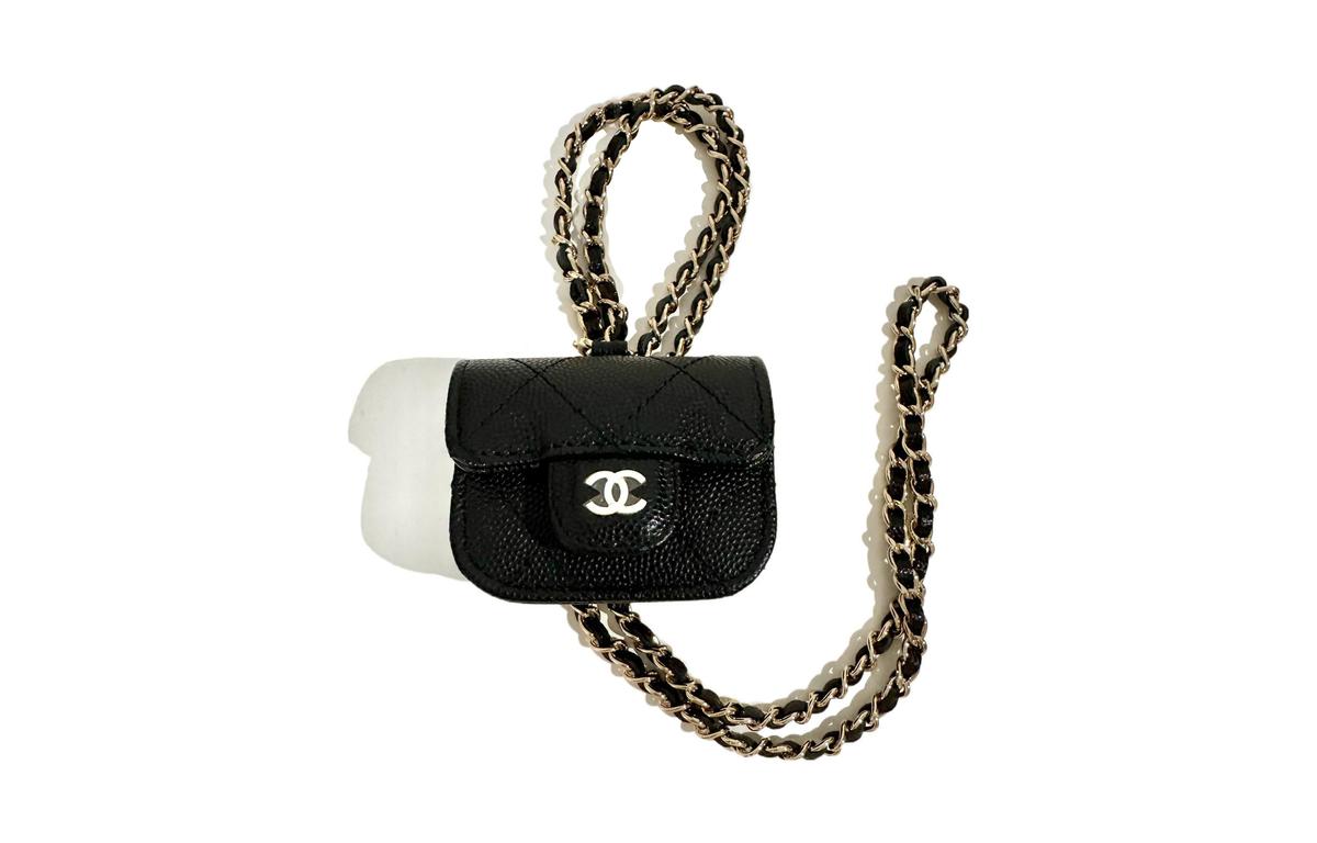 https://d2cva83hdk3bwc.cloudfront.net/AP1739-Y33352-C3906-chanel-lambskin-and-gold-metal-earphone-case-women-s-black-1.jpg