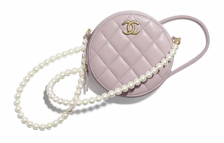 https://d2cva83hdk3bwc.cloudfront.net/AP2191-B05481-NC022-chanel-calfskin-round-cake-bag-crossbody-bags-regular-women-s-light-pink-red-1.jpg