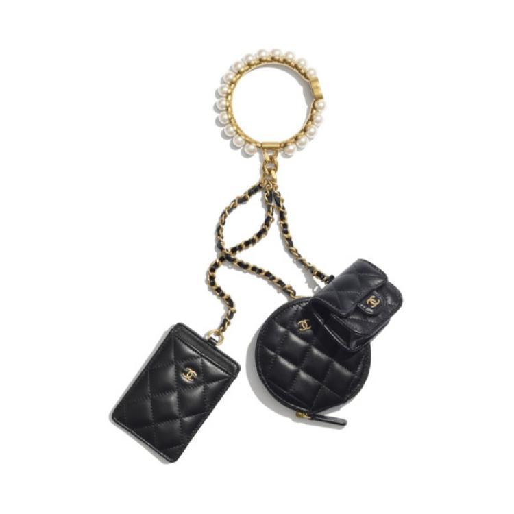https://d2cva83hdk3bwc.cloudfront.net/AP2229-B05945-94305-chanel-sheepskin-3-in-1-bangle-wrist-bag-unisex-1.jpg