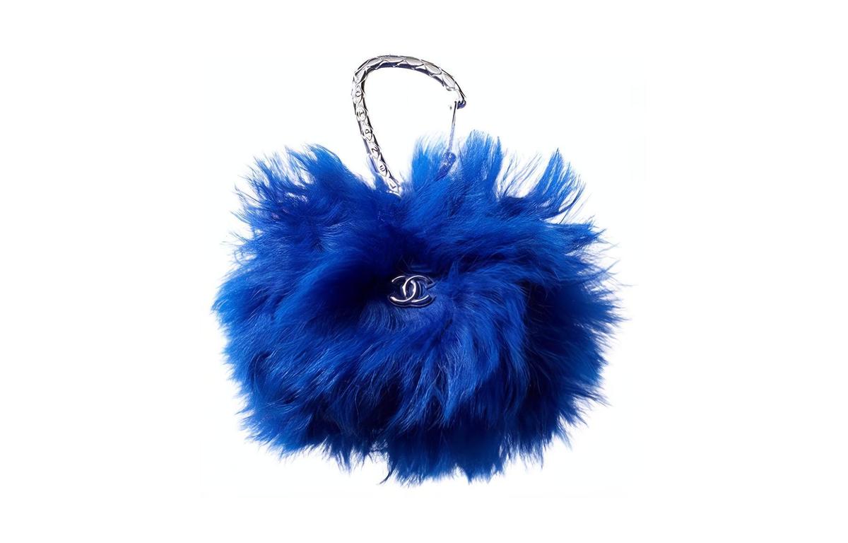 https://d2cva83hdk3bwc.cloudfront.net/AP2397-B06713-NF615-chanel-wool-wallet-fanny-pack-card-holder-mini-women-s-blue-1.jpg