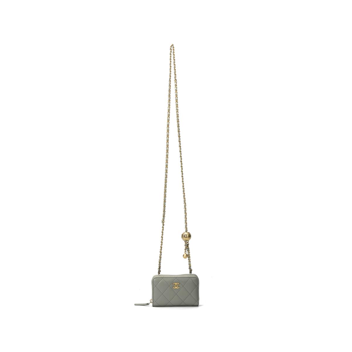 https://d2cva83hdk3bwc.cloudfront.net/AP2462-B02916-NG122-chanel-sheepskin-coin-purse-women-s-light-gray-1.jpg