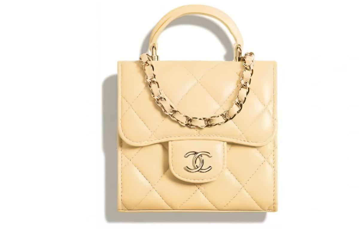 https://d2cva83hdk3bwc.cloudfront.net/AP2682-B06660-NG754-chanel-cow-leather-portable-crossbody-clutch-women-s-chick-yellow-1.jpg