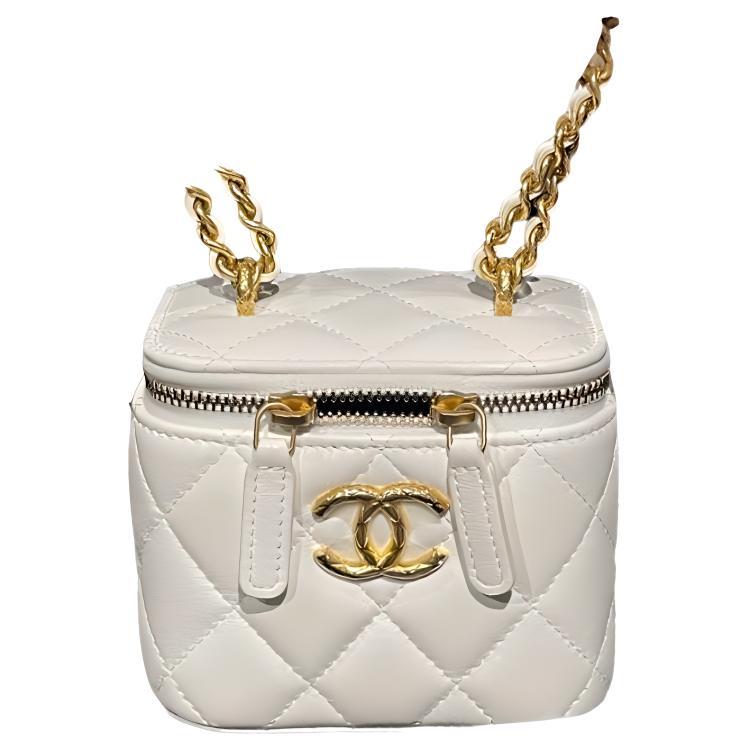 https://d2cva83hdk3bwc.cloudfront.net/AP3103-B09785-10601-chanel-23c-early-spring-lambskin-box-bag-with-mirror-makeup-bag-shoulder-bag-crossbody-bag-women-s-white-1.jpg