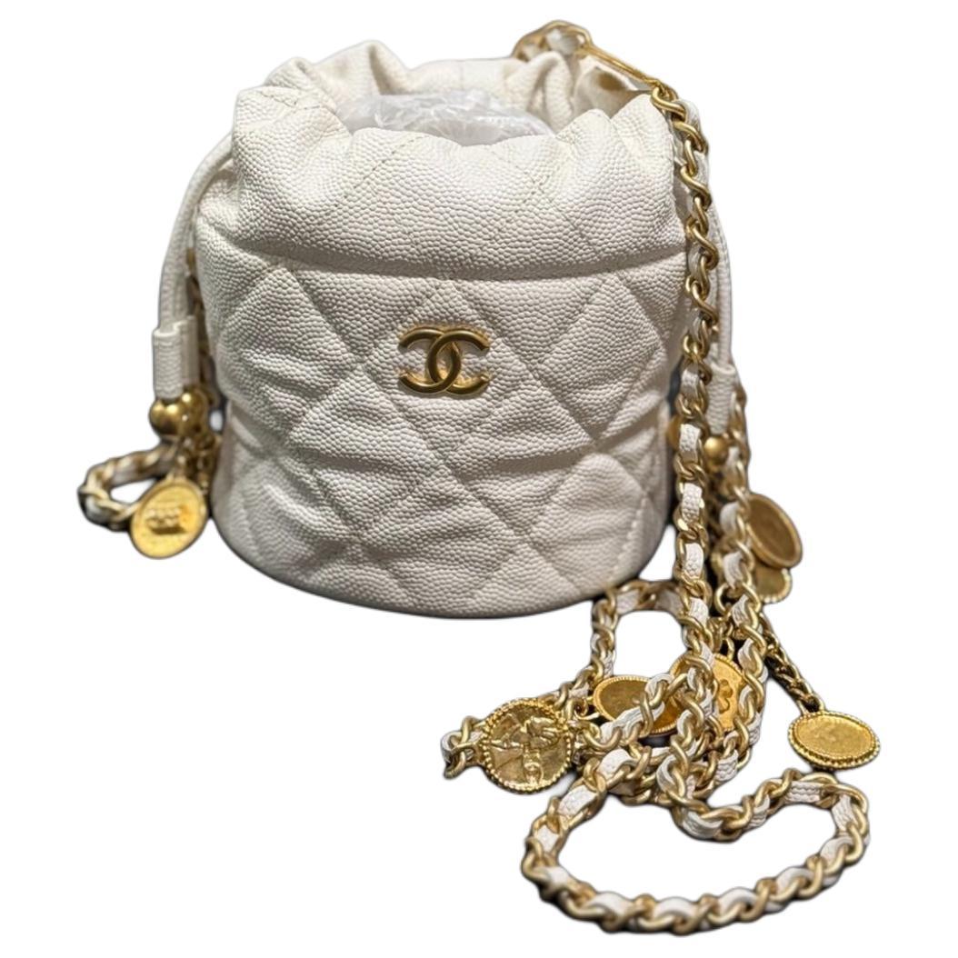 https://d2cva83hdk3bwc.cloudfront.net/AP3111-B09805-NL303-chanel-cow-leather-crossbody-bag-women-s-white-1.jpg