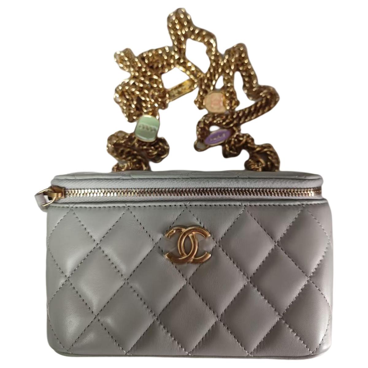 https://d2cva83hdk3bwc.cloudfront.net/AP3120-B09808-NL303-chanel-sheepskin-one-shoulder-makeup-bag-women-s-light-gray-1.jpg