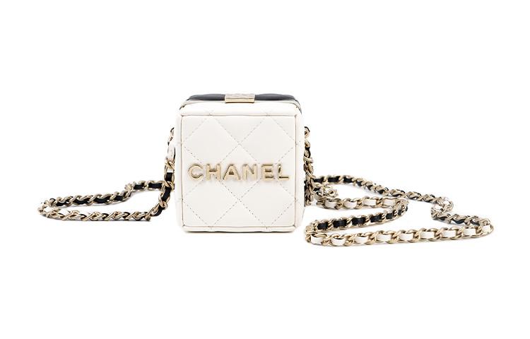 https://d2cva83hdk3bwc.cloudfront.net/AP3154-B09939-NL819-chanel-lambskin-one-shoulder-crossbody-clutches-women-s-black-white-1.jpg