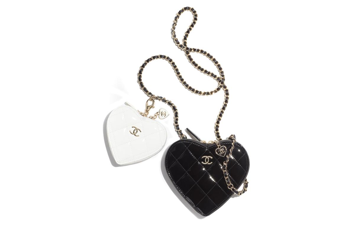 https://d2cva83hdk3bwc.cloudfront.net/AP3295-B10701-NN888-chanel-patent-leather-calfskin-one-shoulder-crossbody-clutches-regular-women-s-black-white-1.jpg