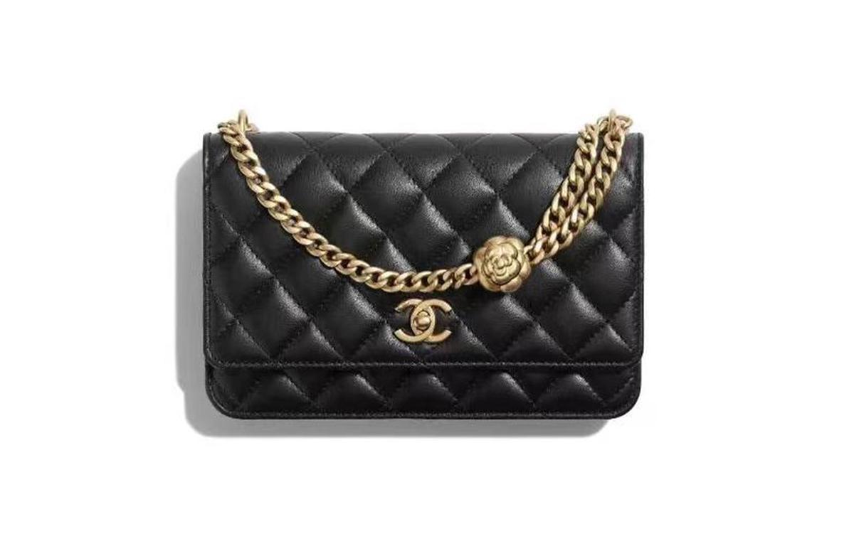 https://d2cva83hdk3bwc.cloudfront.net/AP3297-B10702-94305-chanel-camellia-adjusting-buckle-chain-with-gold-cc-logo-woc-black-1.jpg