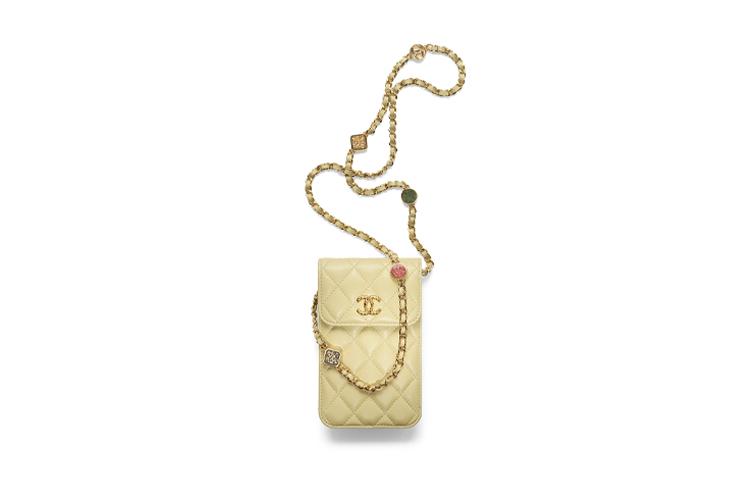 https://d2cva83hdk3bwc.cloudfront.net/AP3415-B12933-NO197-chanel-lambskin-one-shoulder-crossbody-cell-phone-pouch-women-s-light-green-1.jpg