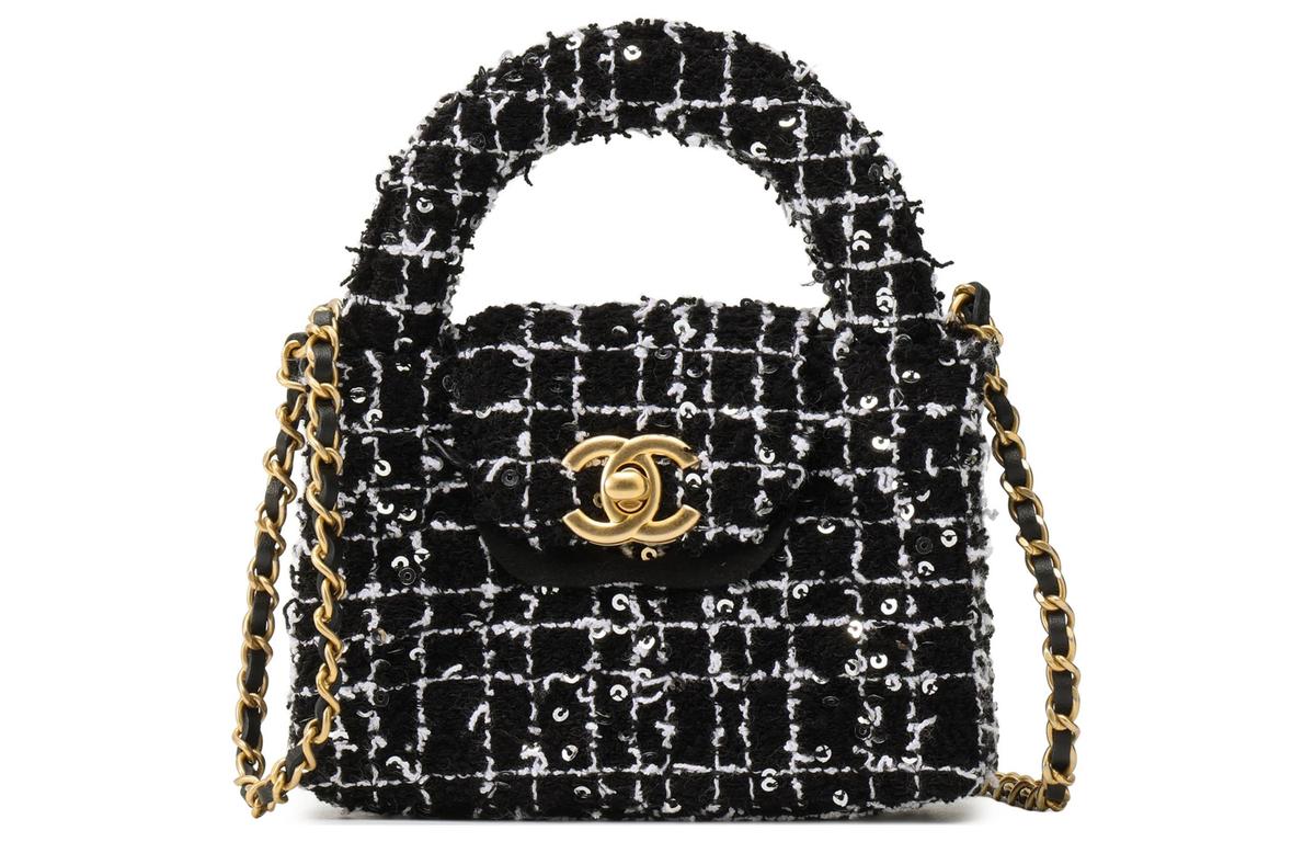 https://d2cva83hdk3bwc.cloudfront.net/AP3435-B16142-NU928-chanel-tweed-clutch-one-shoulder-handbag-extra-mini-women-s-black-white-1.jpg