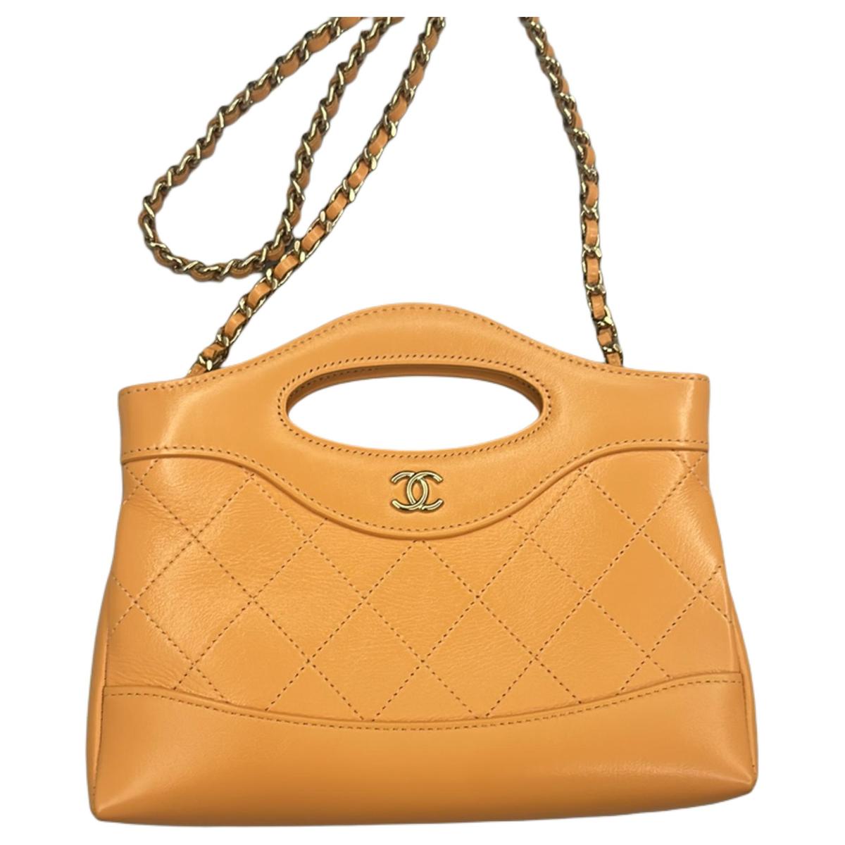 https://d2cva83hdk3bwc.cloudfront.net/AP3656-B14880-NS838-chanel-cow-leather-handbag-shoulder-bag-crossbody-bag-mini-women-s-orange-1.jpg