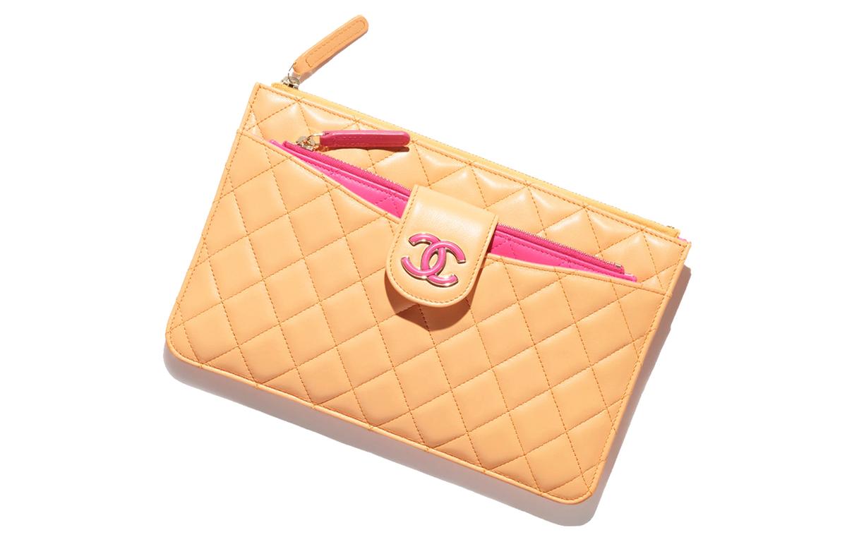 https://d2cva83hdk3bwc.cloudfront.net/AP3659-B14838-NT592-chanel-sheepskin-clutch-women-s-orange-deep-pink-1.jpg