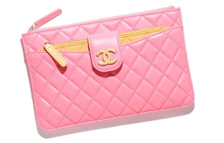 https://d2cva83hdk3bwc.cloudfront.net/AP3659-B14838-NT595-chanel-sheepskin-clutch-women-s-coral-pink-with-orange-accents-1.jpg