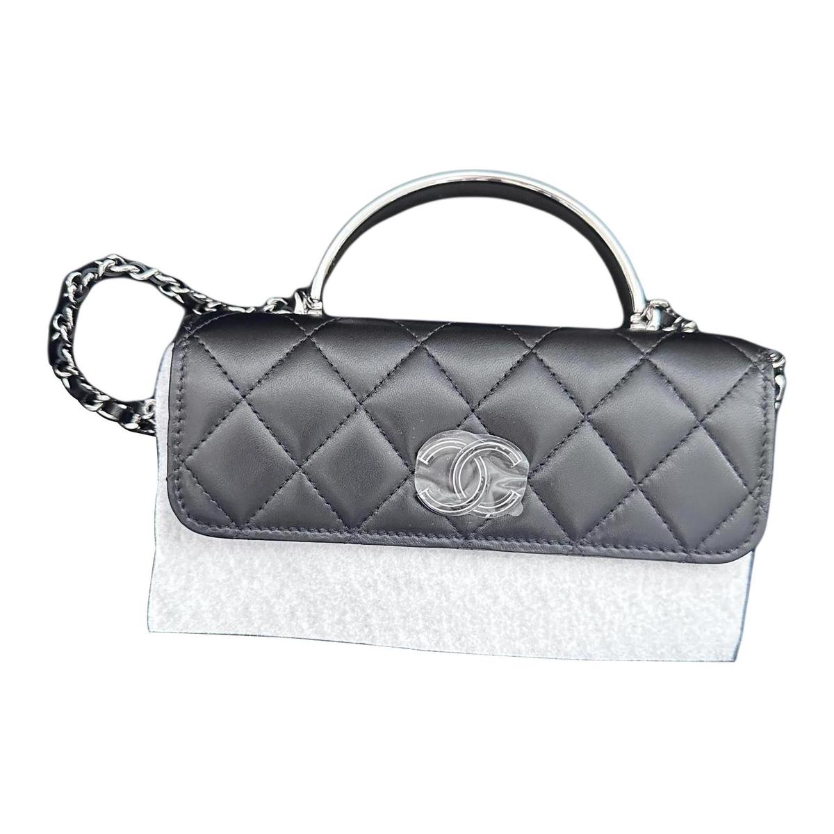 https://d2cva83hdk3bwc.cloudfront.net/AP3707-B14927-94305-chanel-woc-lambskin-mouth-cover-bag-crossbody-bag-women-s-black-1.jpg