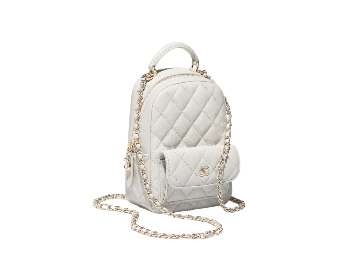https://d2cva83hdk3bwc.cloudfront.net/AP3753-B10583-NAAUH-chanel-small-backpack-in-grained-shiny-calfskin-with-gold-tone-metal-light-grey-2.jpg