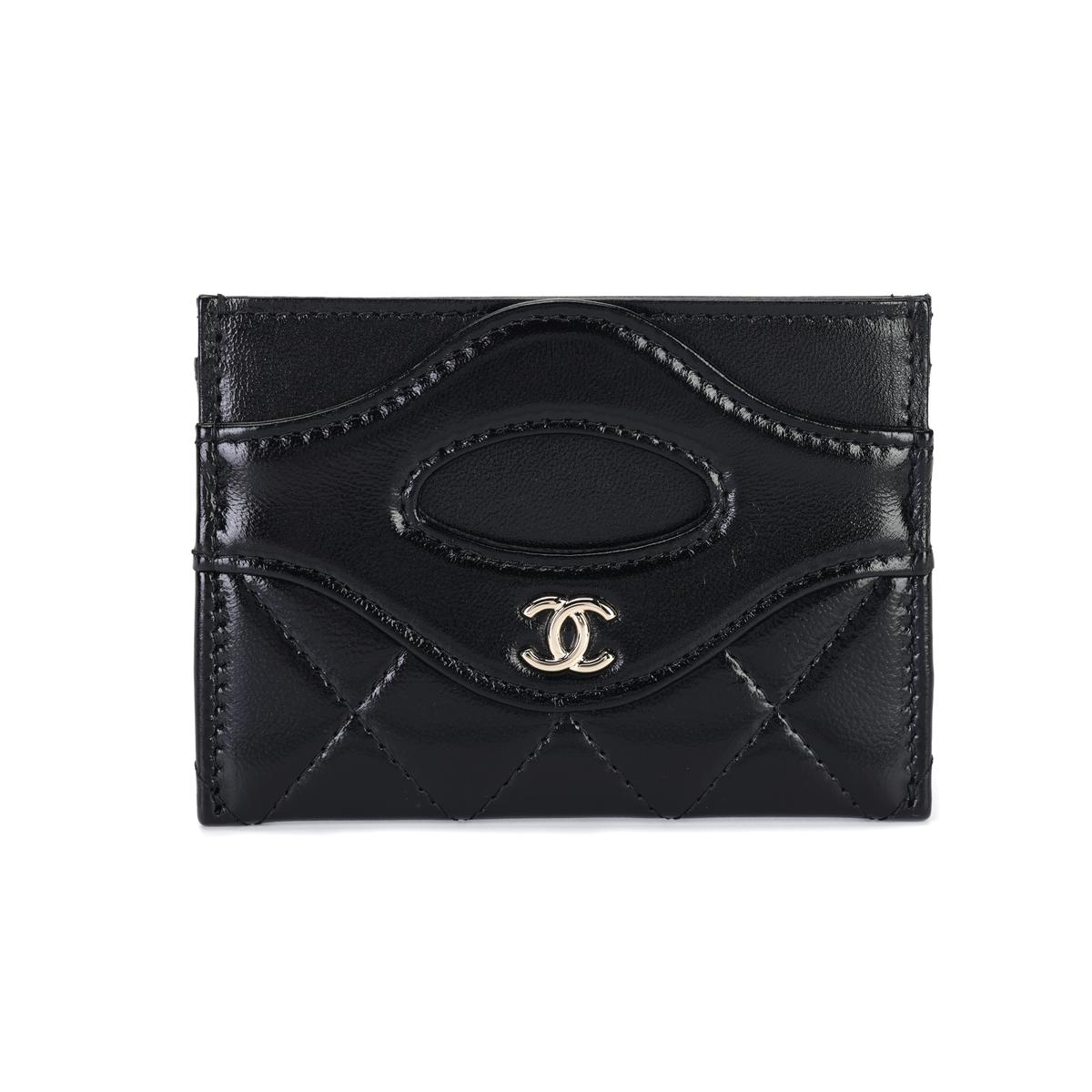 https://d2cva83hdk3bwc.cloudfront.net/AP3873-B16220-94305-chanel-plaid-shiny-calfskin-card-clip-card-holder-unisex-black-1.jpg