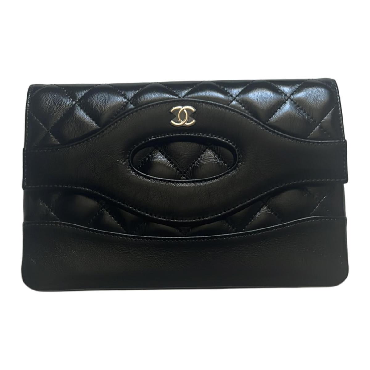 https://d2cva83hdk3bwc.cloudfront.net/AP3874-B16220-94305-chanel-shiny-lambskin-clutch-women-s-black-1.jpg