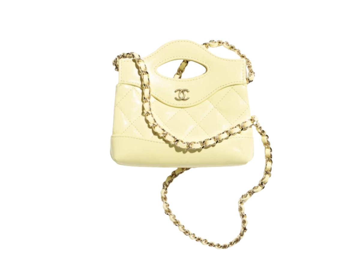 https://d2cva83hdk3bwc.cloudfront.net/AP3875-B16220-NAAUK-chanel-clutch-with-chain-in-shiny-lambskin-with-gold-tone-metal-light-yellow-2.jpg