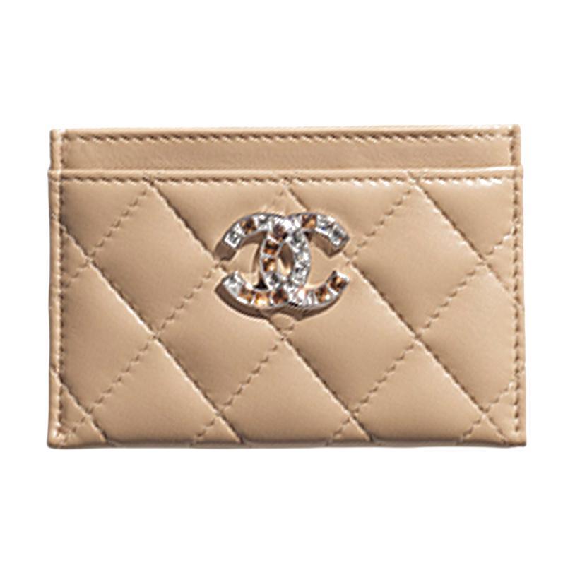 https://d2cva83hdk3bwc.cloudfront.net/AP3990-B16265-NW781-chanel-rhinestone-studded-lambskin-card-holder-women-s-dark-beige-1.jpg