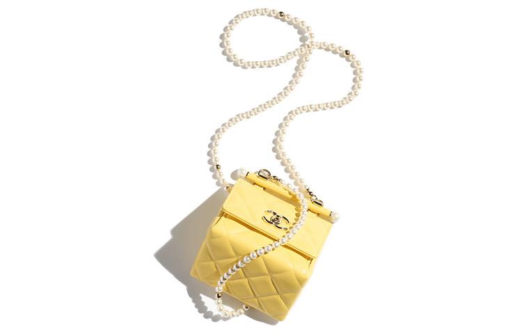 https://d2cva83hdk3bwc.cloudfront.net/AP4006-B16744-NW779-chanel-lambskin-one-shoulder-crossbody-clutches-women-s-yellow-1.jpg