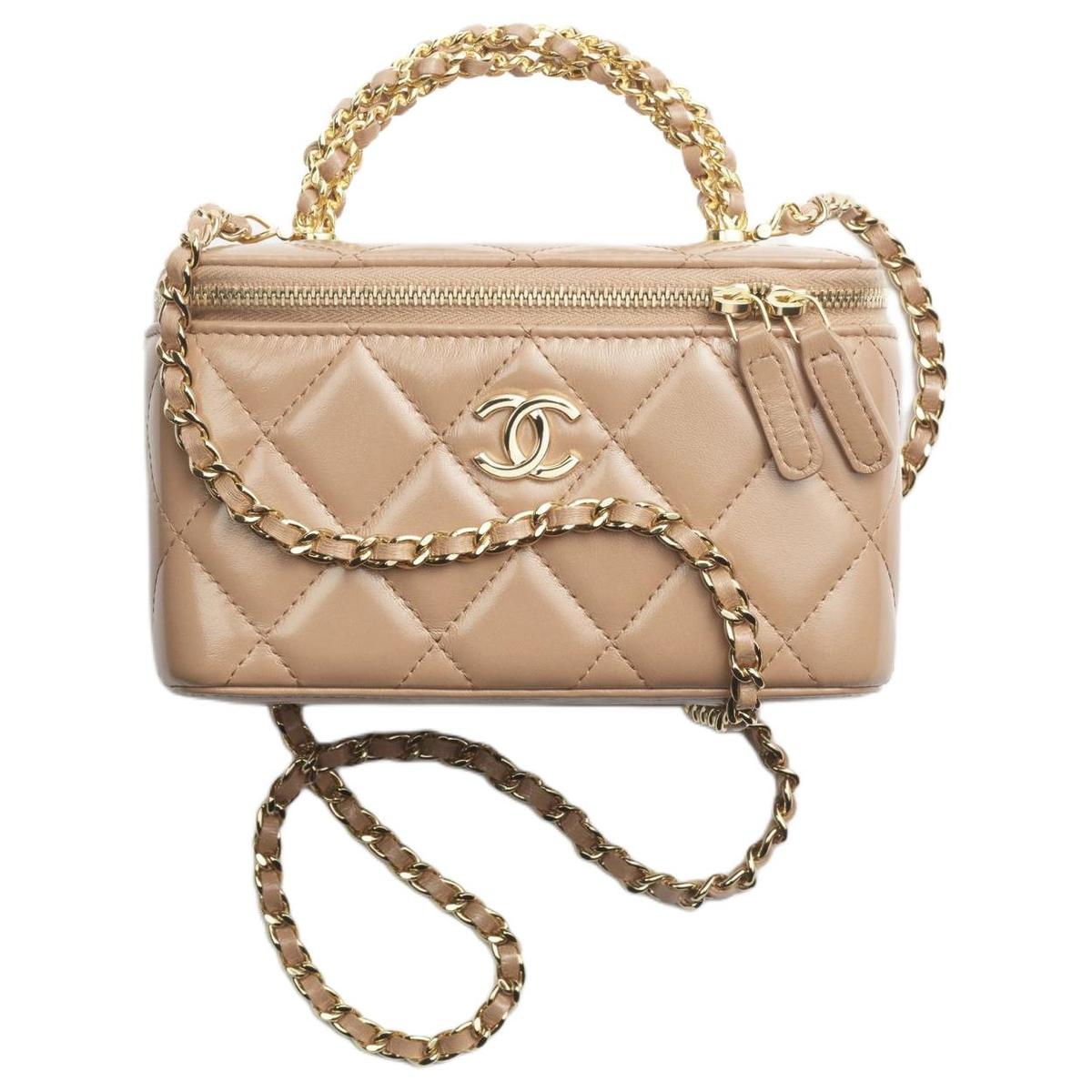 https://d2cva83hdk3bwc.cloudfront.net/AP4168-B17675-NZG77-chanel-shiny-lambskin-portable-crossbody-bag-shoulder-bag-women-s-deep-and-light-camel-1.jpg