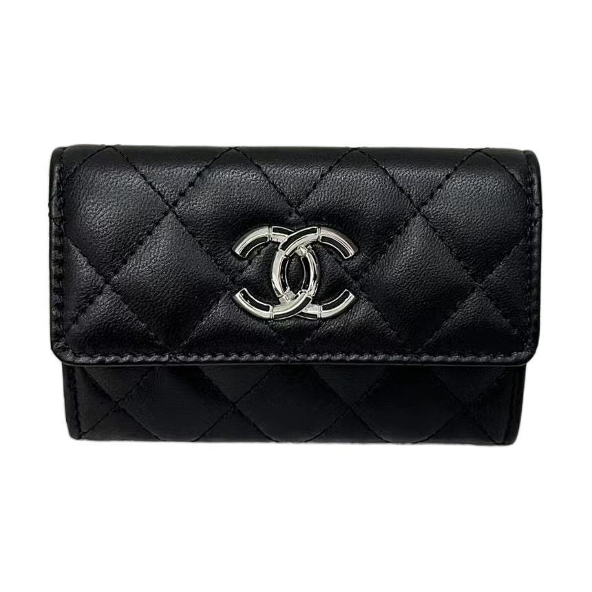 https://d2cva83hdk3bwc.cloudfront.net/AP4194-B17694-94305-chanel-lambskin-card-holder-wallet-women-s-black-1.jpg