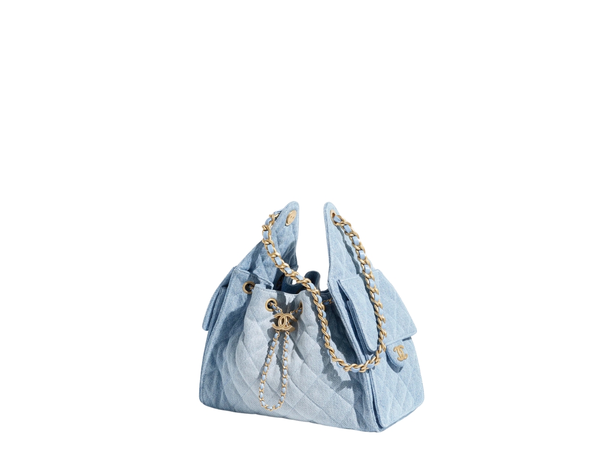 https://d2cva83hdk3bwc.cloudfront.net/AS5293-B20603-U0475-chanel-25-small-bag-in-light-blue-washed-denim-with-gold-metal-hardware-2.jpg