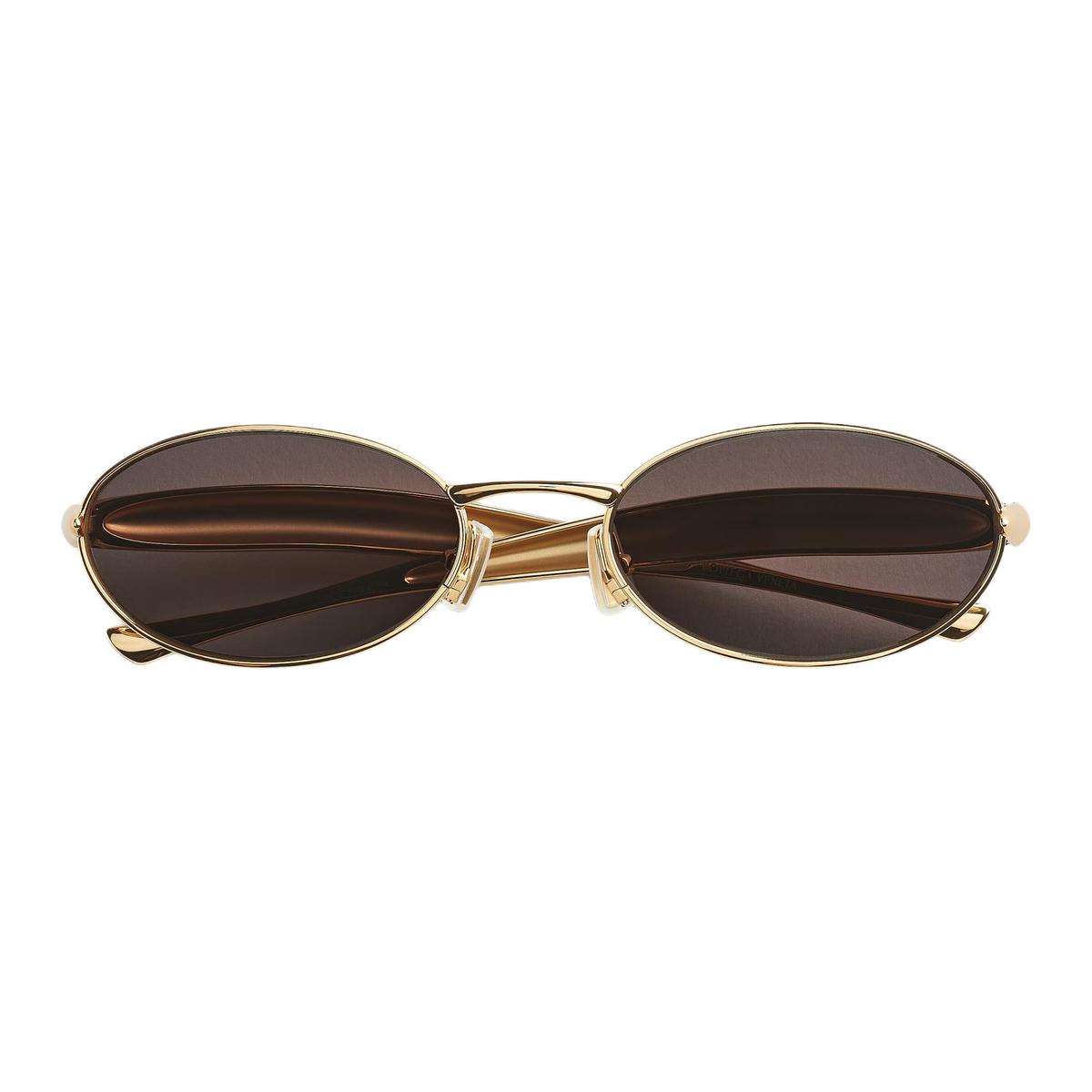 https://d2cva83hdk3bwc.cloudfront.net/BV1386S001-bottega-veneta-metal-oval-sunglasses-women-s-gold-1.jpg