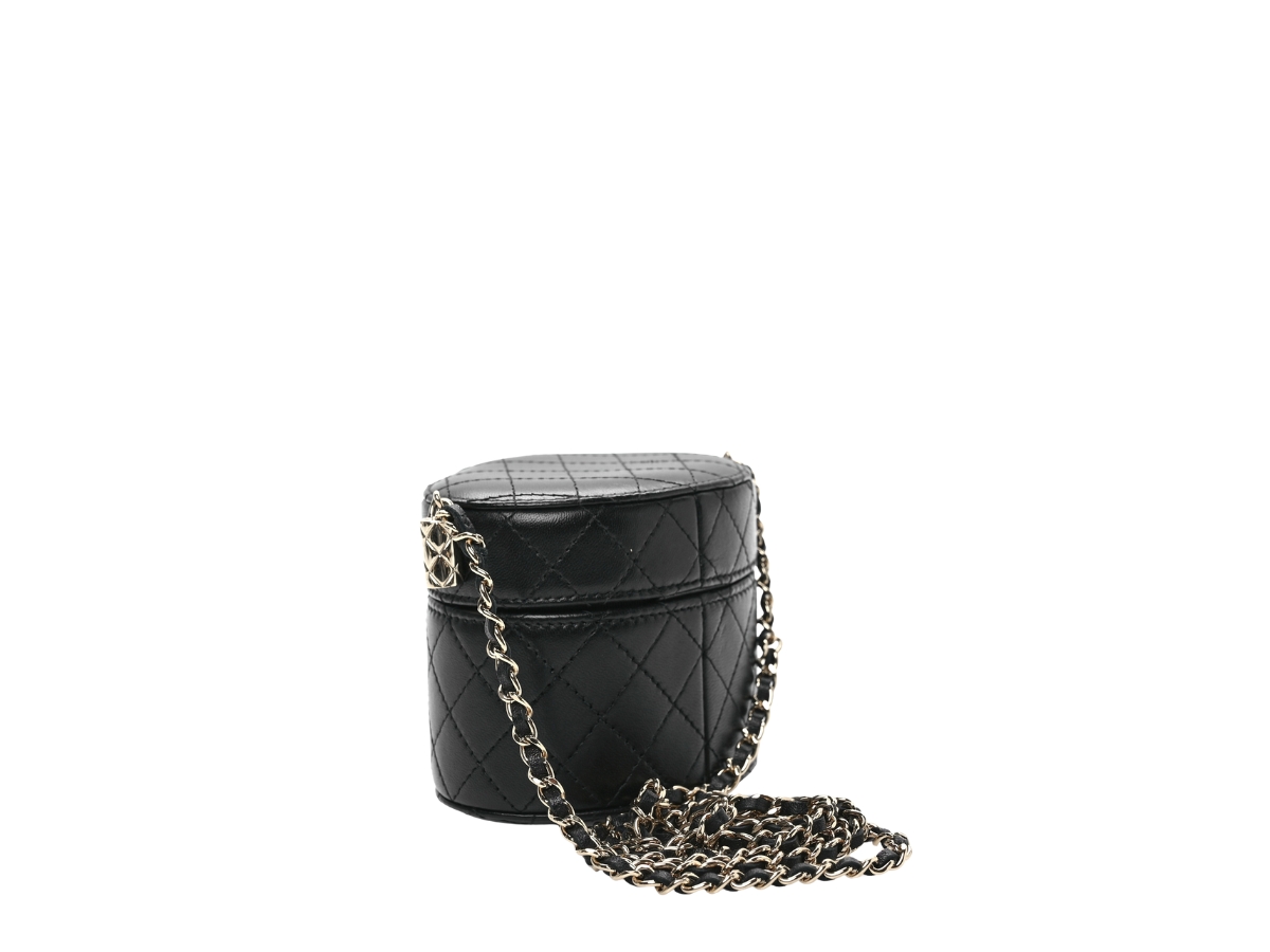 https://d2cva83hdk3bwc.cloudfront.net/CHL-SBBCQMRVCIBLLWSHFVNZ-chanel-quilted-mini-round-vanity-case-in-black-lambskin-leather-with-silver-hardware-2.jpg