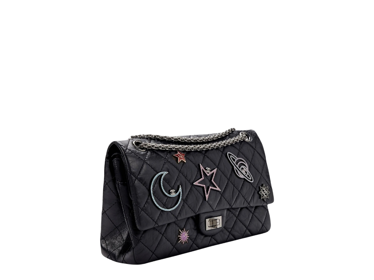 https://d2cva83hdk3bwc.cloudfront.net/CHL-SBBCR25SCLISTHWBL4O9-chanel-reissue-2-55-space-charms-limited-in-silver-tone-hardware-with-black-2.jpg