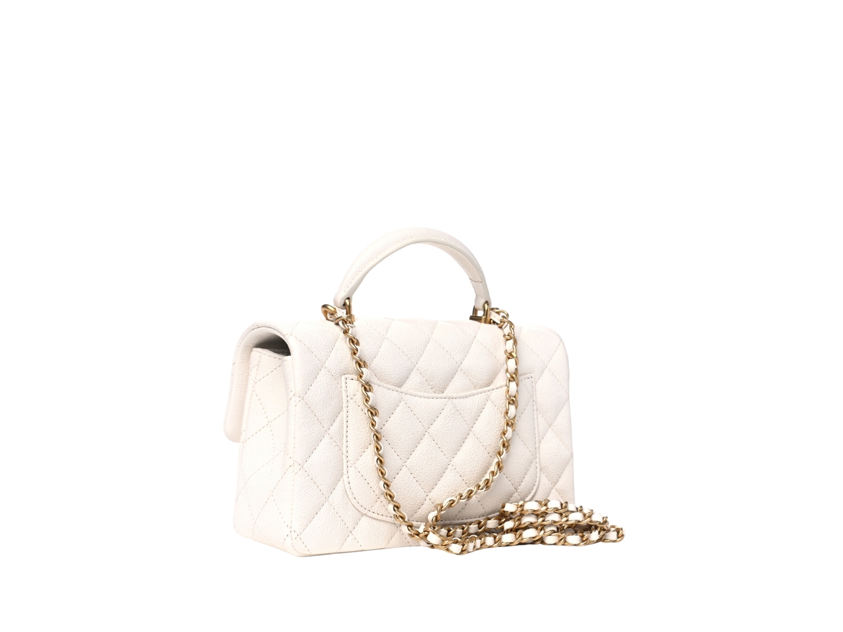 https://d2cva83hdk3bwc.cloudfront.net/CHL-TBBCCQMTHRFW98PZ-chanel-caviar-quilted-mini-top-handle-rectangular-flap-white-2.jpg