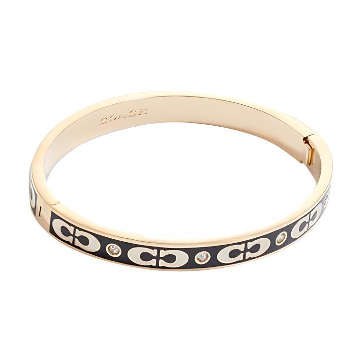 https://d2cva83hdk3bwc.cloudfront.net/CI904-GDBK-coach-brass-bangles-women-s-gold-black-1.jpg