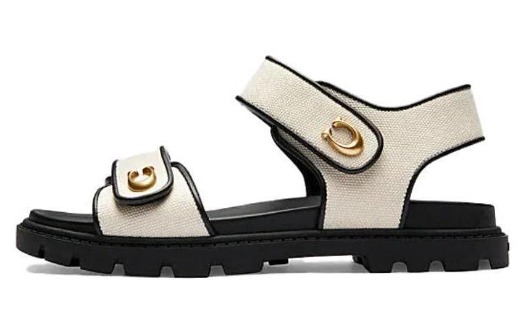 https://d2cva83hdk3bwc.cloudfront.net/CS093-MQV-coach-brynn-canvas-flat-sandals-1.jpg