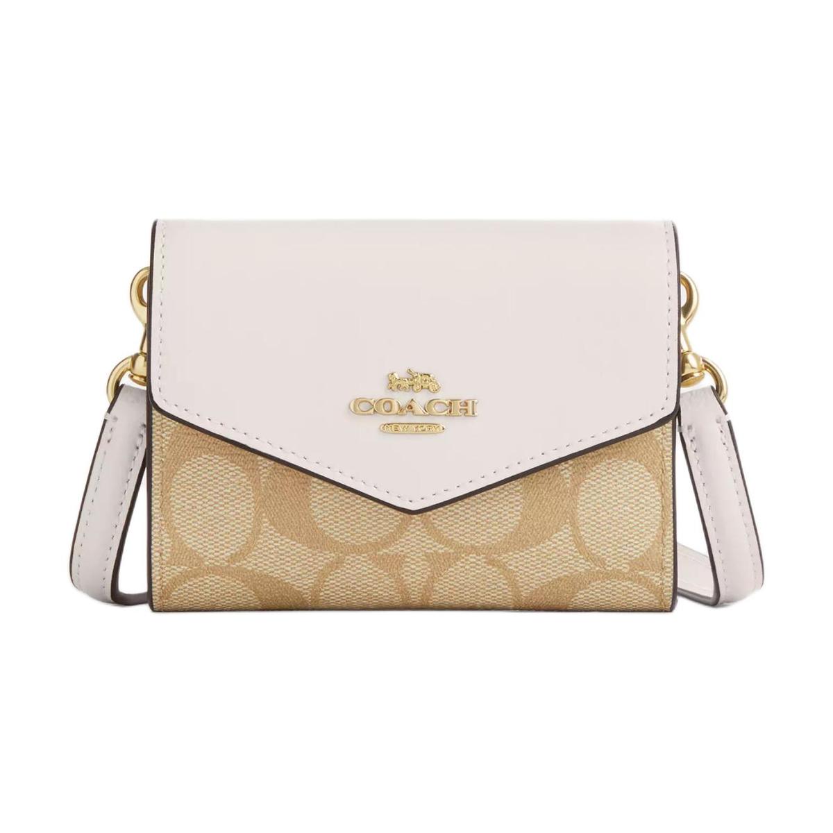 https://d2cva83hdk3bwc.cloudfront.net/CU172-IMDQC-coach-envelope-canvas-with-leather-envelope-wallets-mini-women-s-gold-light-khaki-chalk-1.jpg