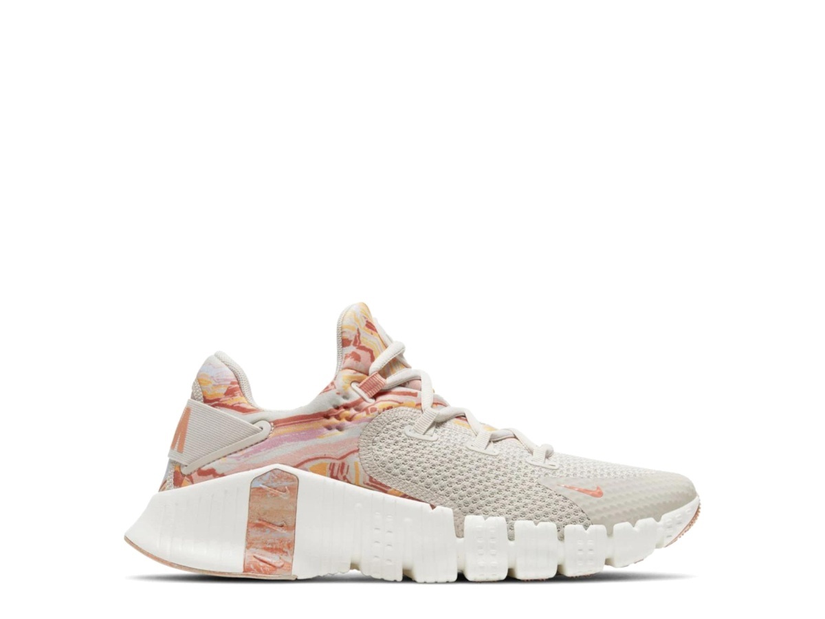 https://d2cva83hdk3bwc.cloudfront.net/DJ3075-064-nike-free-metcon-4-desert-sand-crimson-bliss-women-s--1.jpg