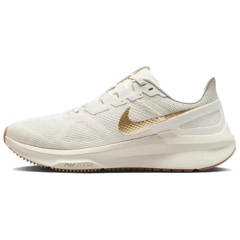https://d2cva83hdk3bwc.cloudfront.net/DJ7884-007-nike-structure-25-phantom-metallic-gold-women-s-1.jpg