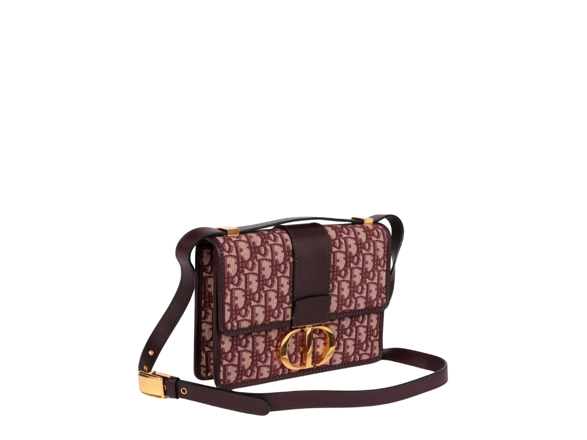 https://d2cva83hdk3bwc.cloudfront.net/DOR-SBBDBOJBL3MBIGHWRIJ1Y-dior-burgundy-oblique-jacquard-burgundy-leather-30-montaigne-bag-in-gold-hardware-with-red-2.jpg