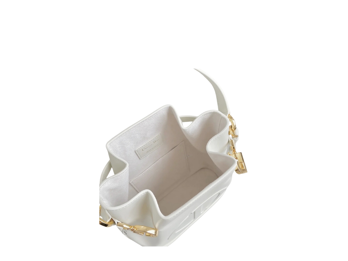 https://d2cva83hdk3bwc.cloudfront.net/DOR-SBBDSCEDBIWCECWCLCGHWHZYP-dior-small-c-est-dior-bag-in-white-cd-embossed-calfskin-with-cd-lock-closure-gold-hardware-white-3.jpg