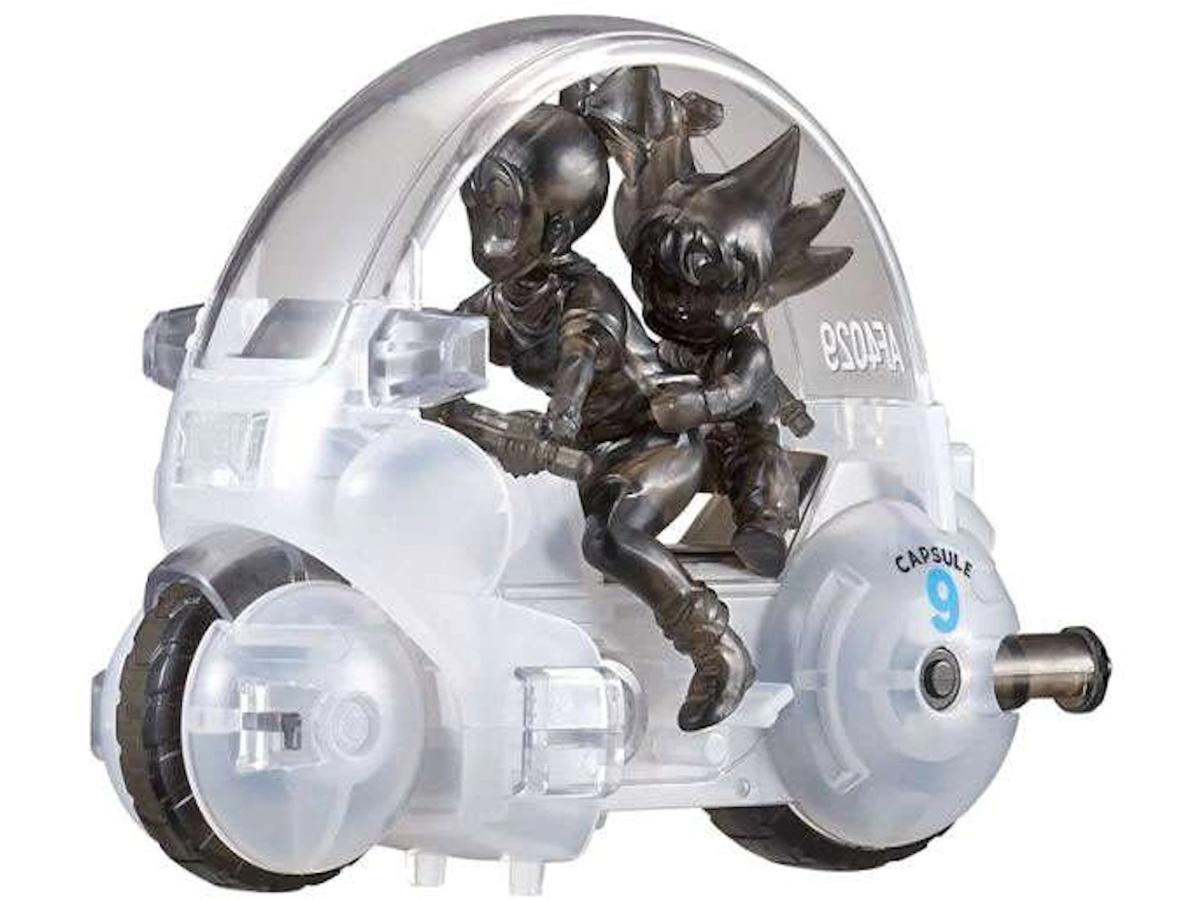 https://d2cva83hdk3bwc.cloudfront.net/G-BAN-ACA4B83-bandai-dragon-ball-mecha-collection-dragon-ball-bulma-s-capsule-no-9-motorcycle-clear-sdcc-2018-san-diego-comic-con-exclusive-pvc-figure-1.jpg