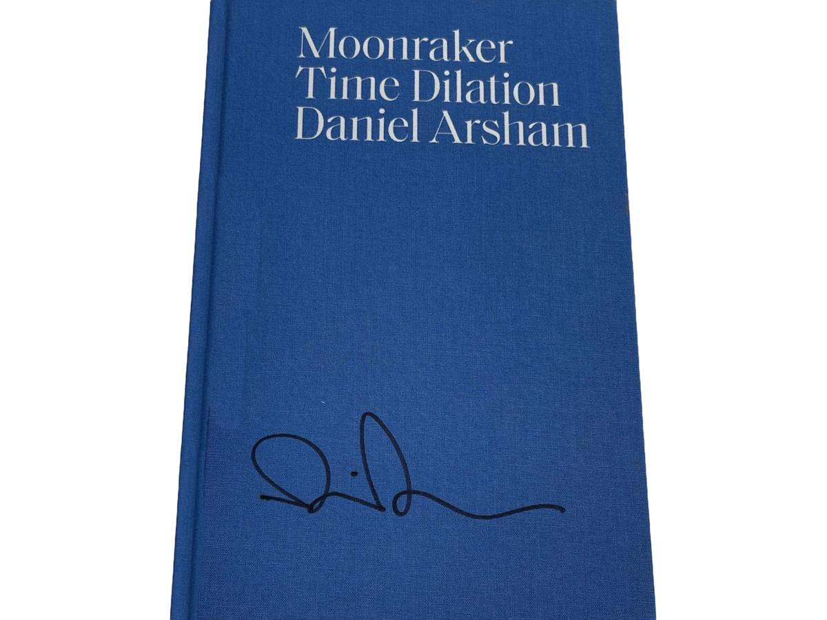 https://d2cva83hdk3bwc.cloudfront.net/G-DAN-EADBDB5-daniel-arsham-moonraker-time-dilation-signed-hardcover-book-1.jpg